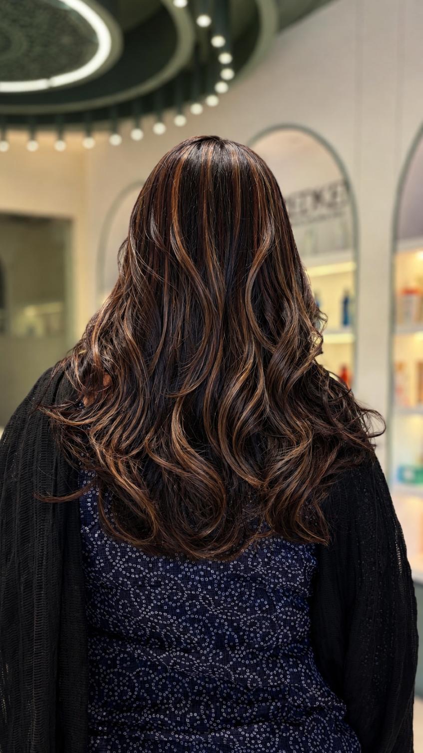 Hair colouring service in progress at Page 3 Luxury Salon Madurai
